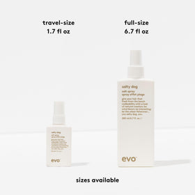 EVO Salty Dog bottle in hand to show 6.8 fl oz scale