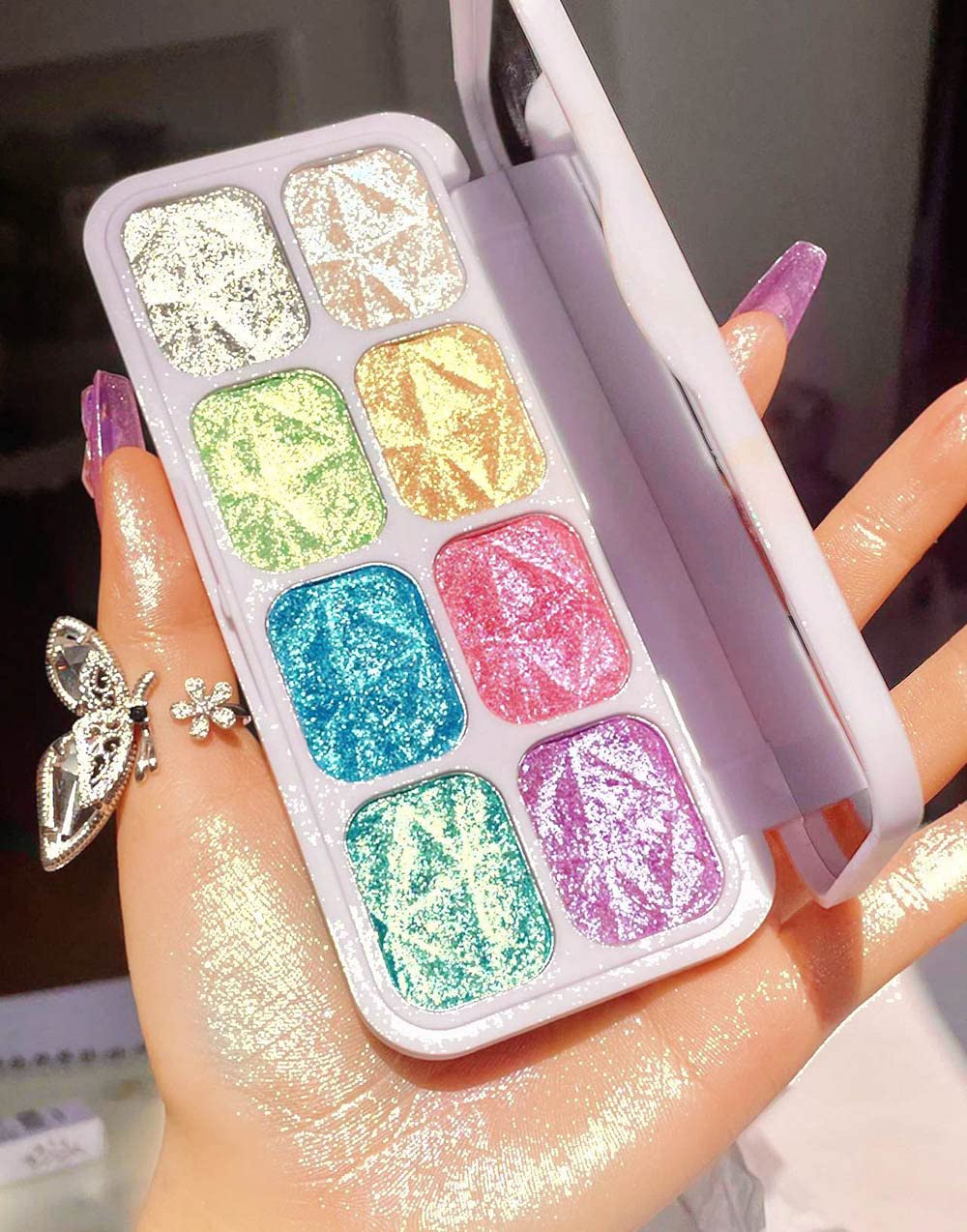 evpct palette front open showing eight multichrome shades and mirror for versatile looks