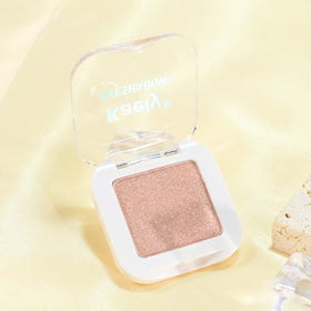 evpct palette beside coin to show compact size and portability benefit