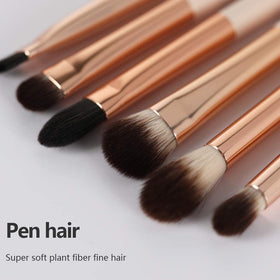 EVRCHGIEA brushes held in hand showing compact size and travel-friendly scale