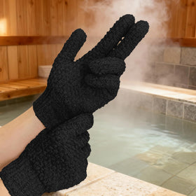 Evridwear gloves next to a hand showing one-size-fits-most stretch