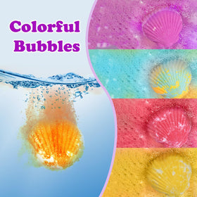 Excalla fizzing in tub with colorful water demonstrating playful bath time