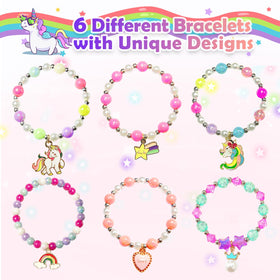 Excalla reveal of unicorn-style bracelet surprise demonstrating toy reward and excitement