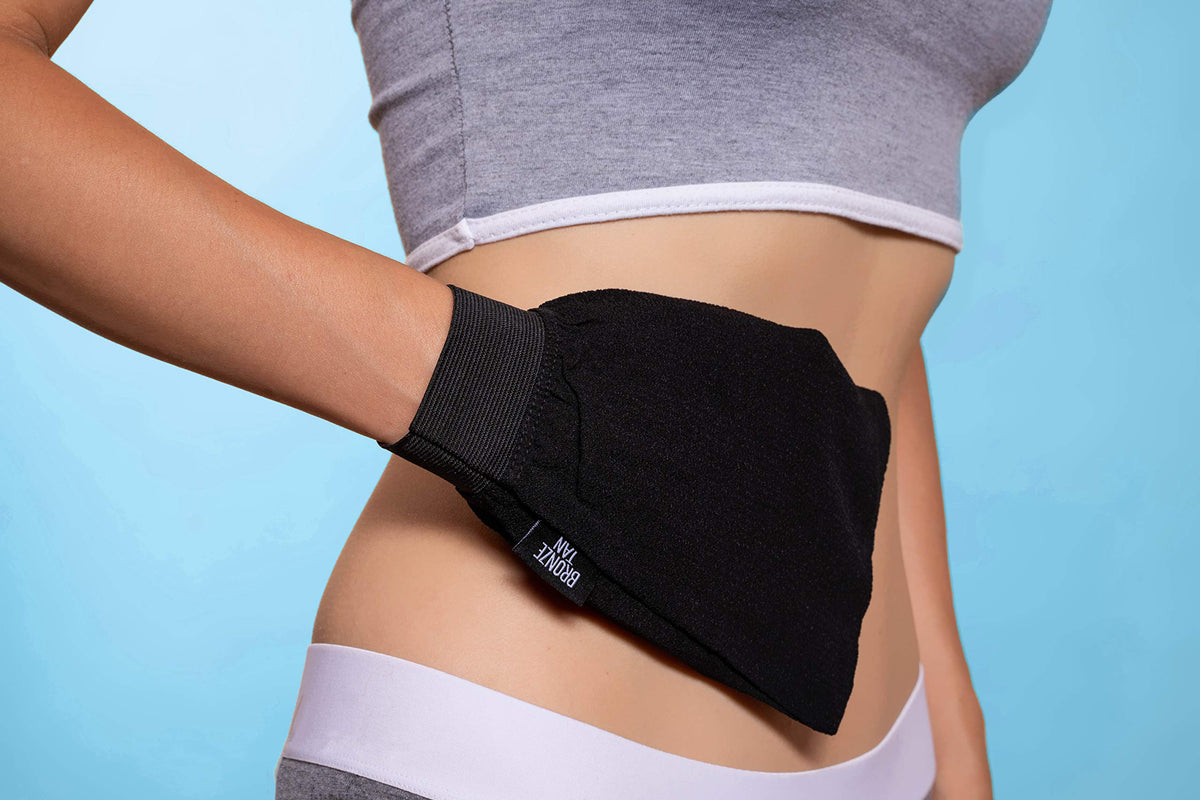 Existing Beauty glove in shower demonstrating gentle, wet exfoliation