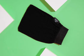 Existing Beauty glove in bathroom lifestyle shot showing simple routine benefit