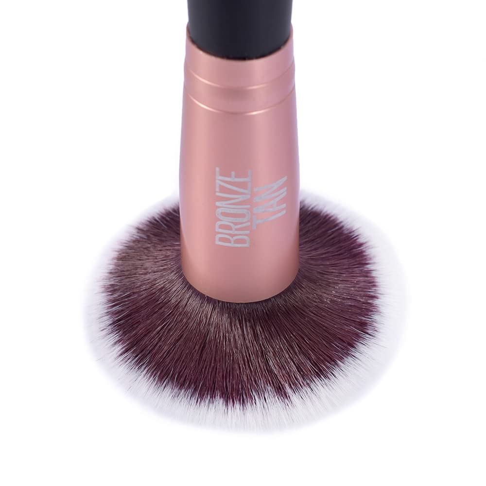 Existing Beauty mitt applying self-tanner on arm for even, controlled coverage