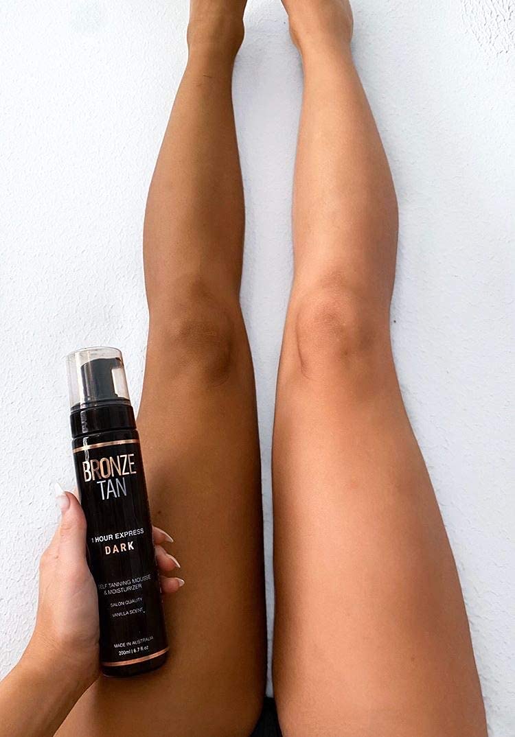 Existing Beauty mousse applied with mitt demonstrating streak-free, even application