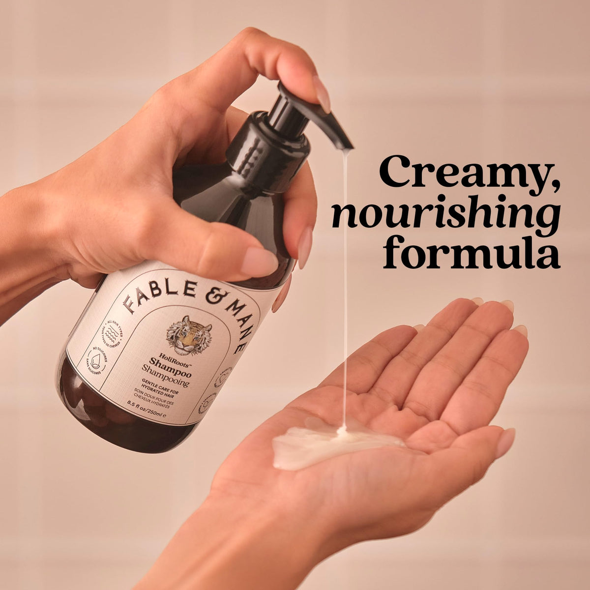 Fable & Mane bottle in hand to show size and scale for shopping clarity