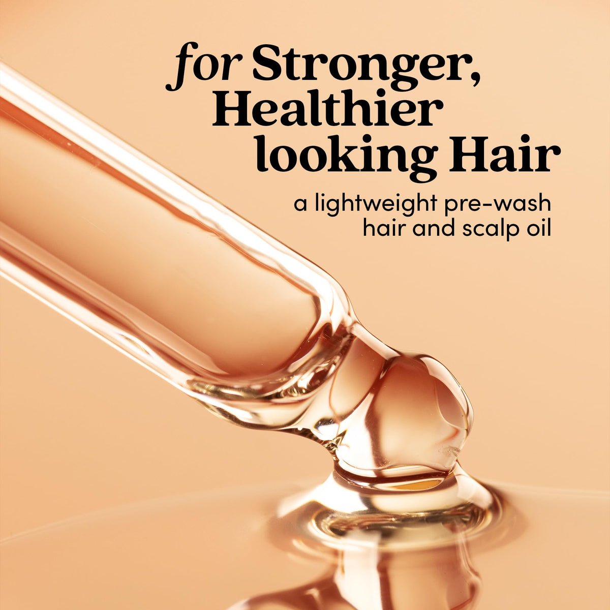 Fable & Mane oil texture on hand displaying silky, non-greasy absorption