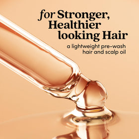 Fable & Mane oil texture on hand displaying silky, non-greasy absorption