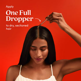 Fable & Mane applied to scalp during massage to show nourishment benefits