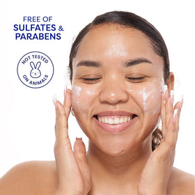 FACETORY mask held in hand to show single-use size and travel-friendly convenience
