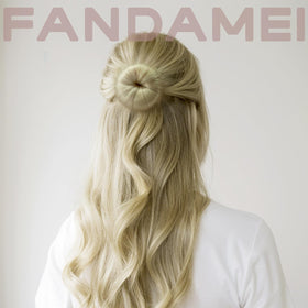 fandamei teen wearing small bun showing sleek performance-ready hold