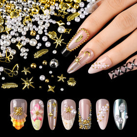 Fandamei wax pencil and tweezer placed beside gems for precise application