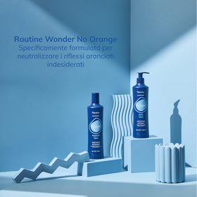 Fanola applied to brunette hair showing neutralized brassy tones