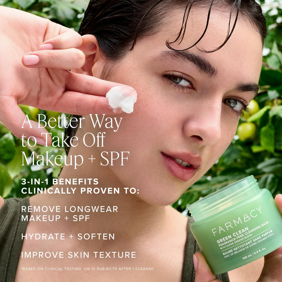 Hand massaging Farmacy balm into dry skin, demonstrating effective makeup dissolution