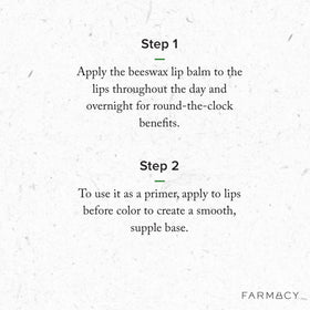 Farmacy beeswax lip balm applied to lips demonstrating softened, prepped finish