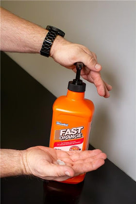 Fast Orange in use on mechanic hands removing grease quickly