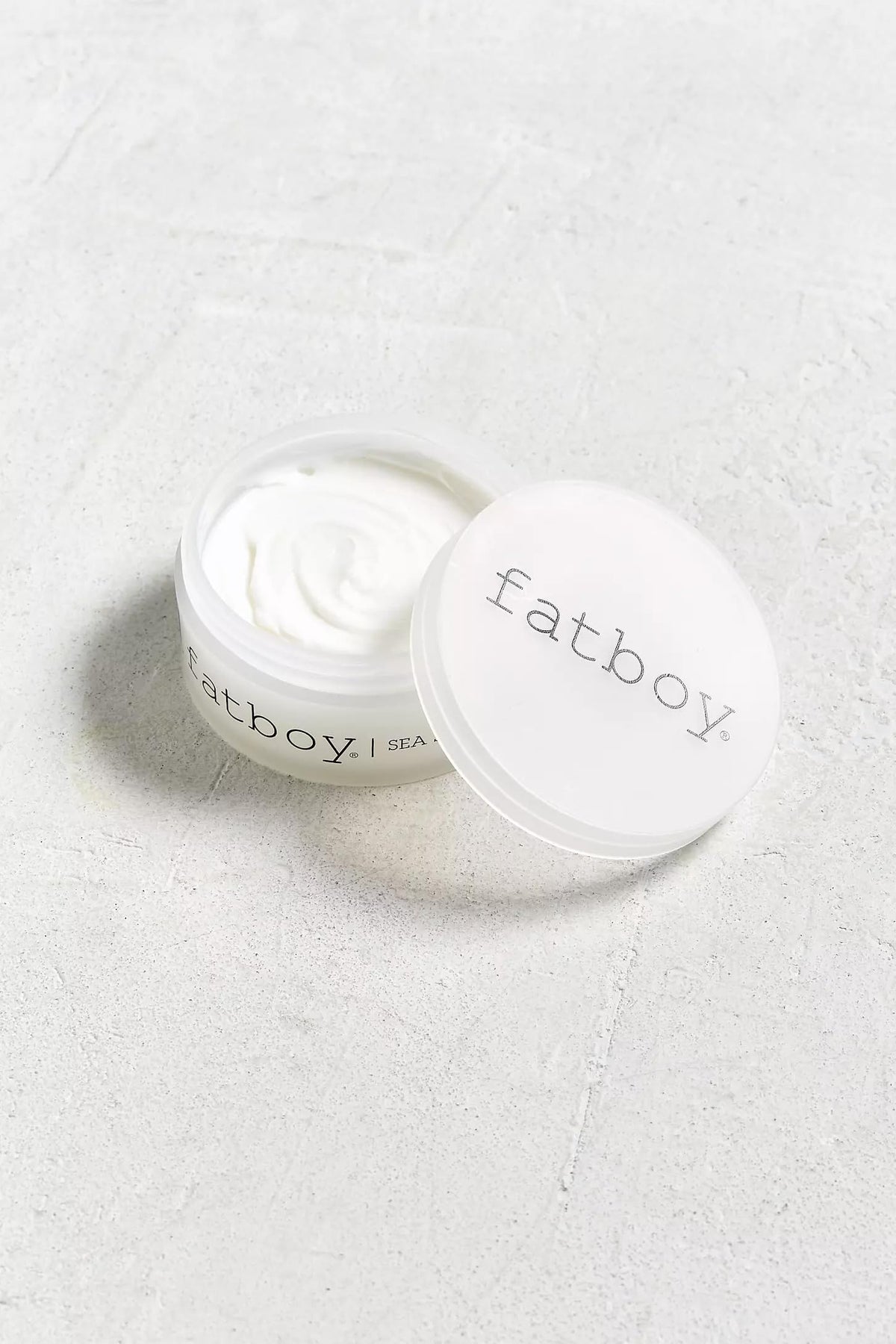 Fatboy lifestyle beach scene with tousled waves demonstrating natural beach finish