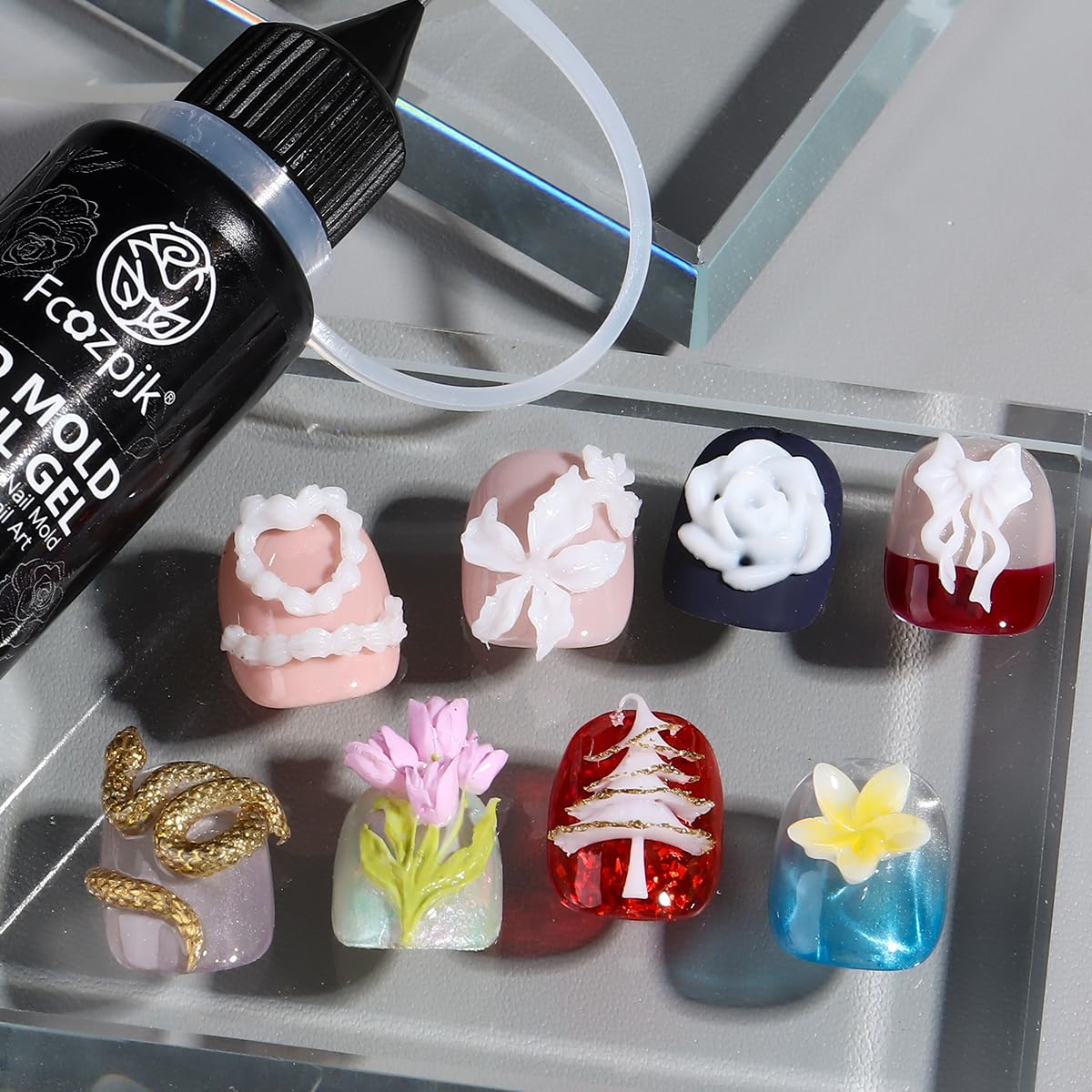 Fcozpjk cured nail charms on swatch displaying durable shine and design clarity
