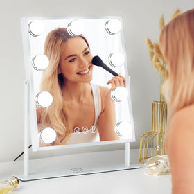 FENCHILIN vanity mirror in bedroom setting creating flattering ambient light