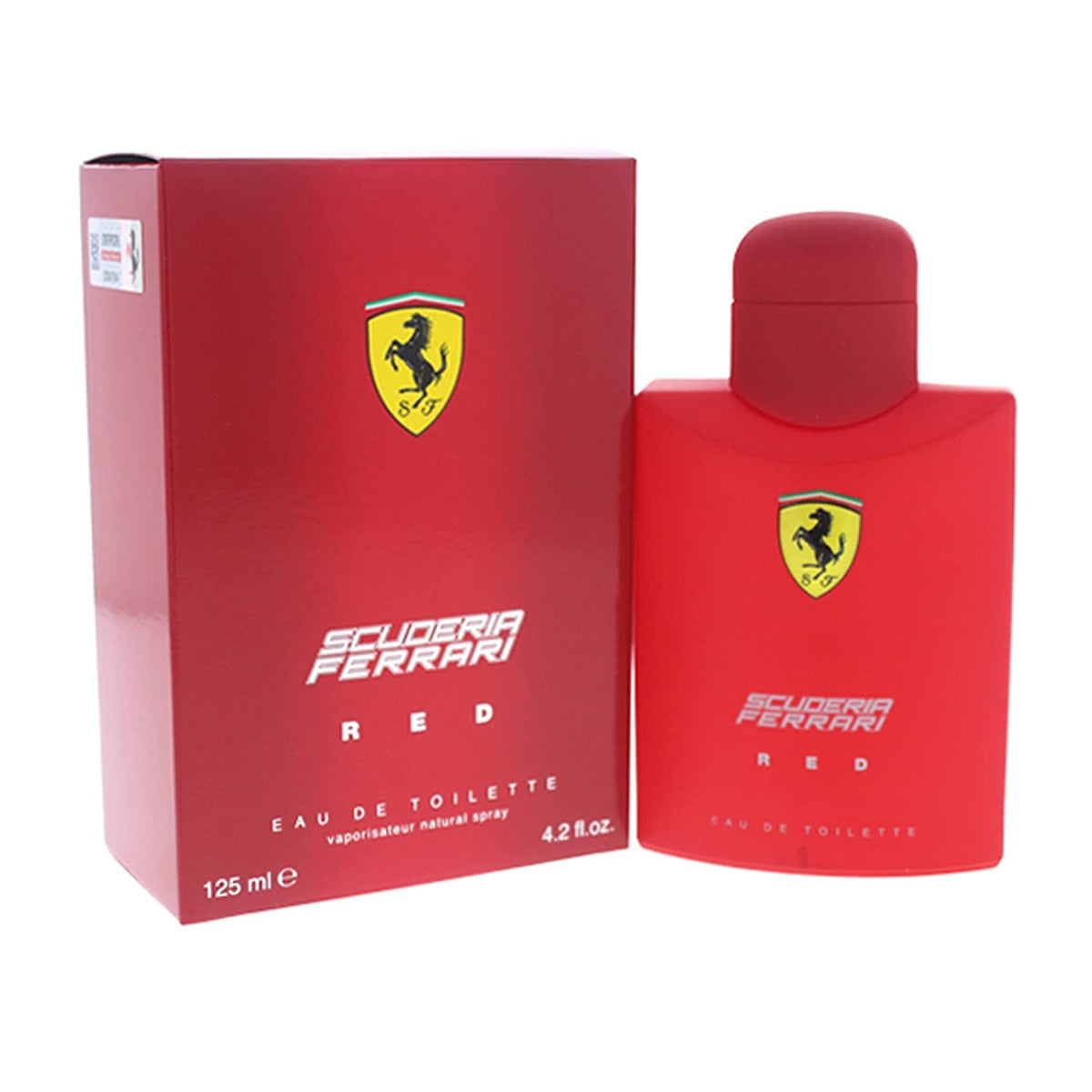 Ferrari Scuderia Red bottle held in hand showing 4.2 oz size and scale