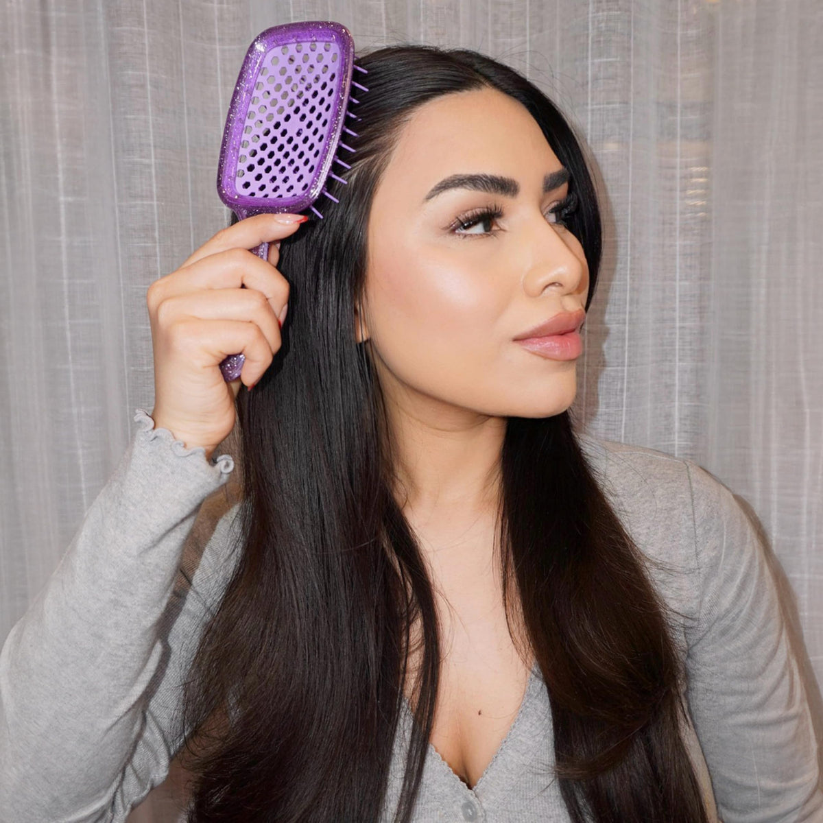 FHI Heat UNbrush DuoFlex bristles close-up showing dual-length anti-static bristles reducing breakage