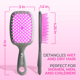 FHI Heat Unbrush held in hand to show scale and ergonomic grip for comfortable styling