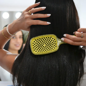 FHI Heat UNbrush on bathroom counter indicating everyday styling convenience