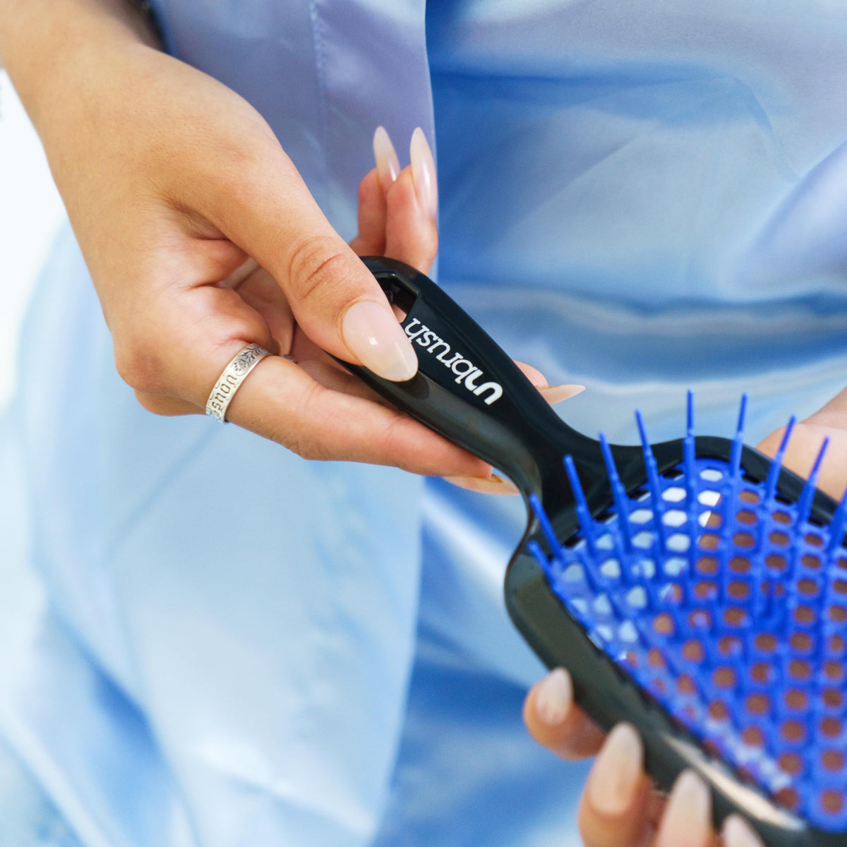FHI Heat UNbrush packed in travel pouch for on-the-go styling and convenience