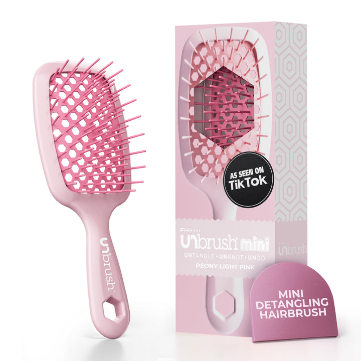 FHI Heat UNbrush Mini front view showing compact design and peony pink color for travel convenience