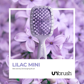 FHI Heat UNbrush placed with travel pouch showing portability and on-the-go styling benefit