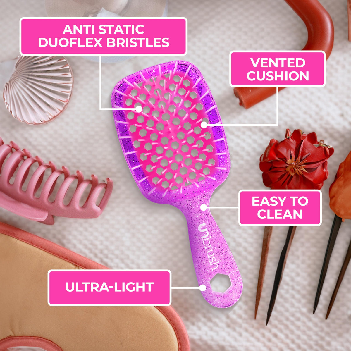 FHI Heat UNbrush Mini detangling wet hair showing gentle, pain-free knot removal