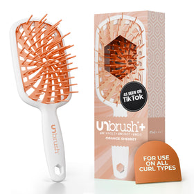 FHI Heat UNbrush Plus front view showing brush shape and lightweight design benefit