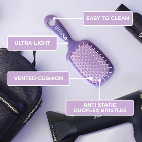 FHI Heat UNbrush detangling wet hair while minimizing tugging and protecting fragile strands