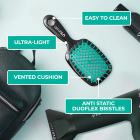 FHI Heat UNbrush detangling wet hair demonstrating gentle knot removal without pain