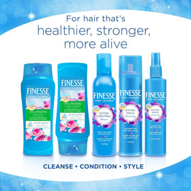 FINESSE shampoo applied to hair in salon-style setting for volumizing benefit