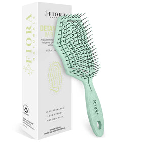 Fiora Naturals front view showing green brush and vented body, gentle detangling benefit
