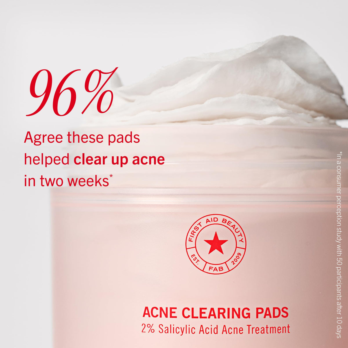 First Aid Beauty pads next to coin showing compact 60-count jar size