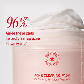 First Aid Beauty pads next to coin showing compact 60-count jar size