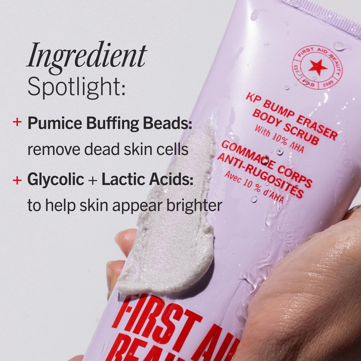 First Aid Beauty scrub being applied in shower to demonstrate use
