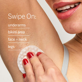 First Aid Beauty pad on face and neck illustrating gentle exfoliation