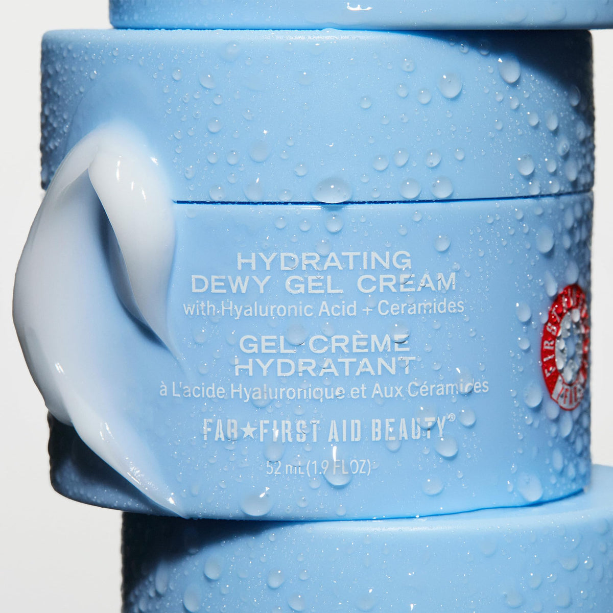 First Aid Beauty product in hand to show size and travel-friendly benefit