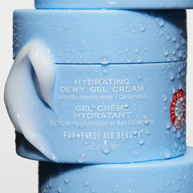 First Aid Beauty product in hand to show size and travel-friendly benefit