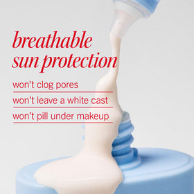First Aid Beauty sunscreen milk in hand to show 1.7 oz size and portability