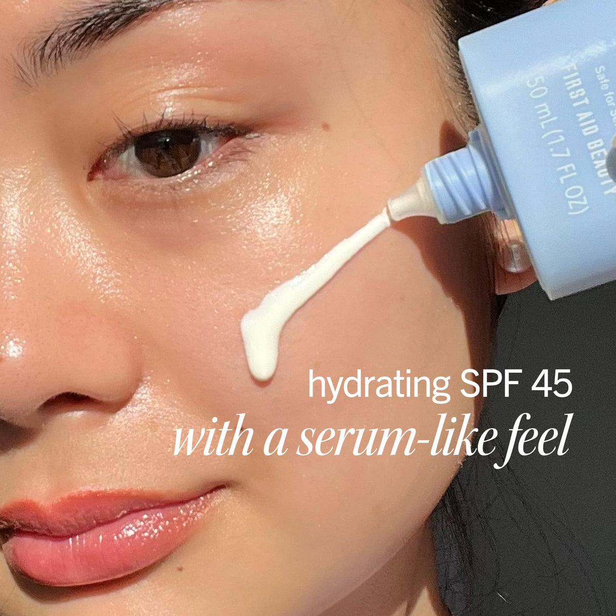 First Aid Beauty texture close-up of milky serum showing lightweight absorption