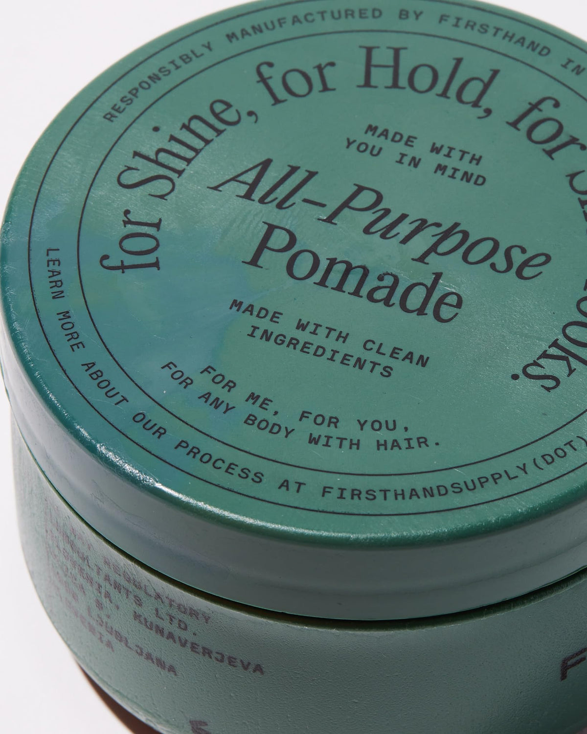 Firsthand Supply rinsing pomade out under water showing easy washout benefit