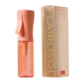 FLAIROSOL peach front view showing compact travel-ready design and portability