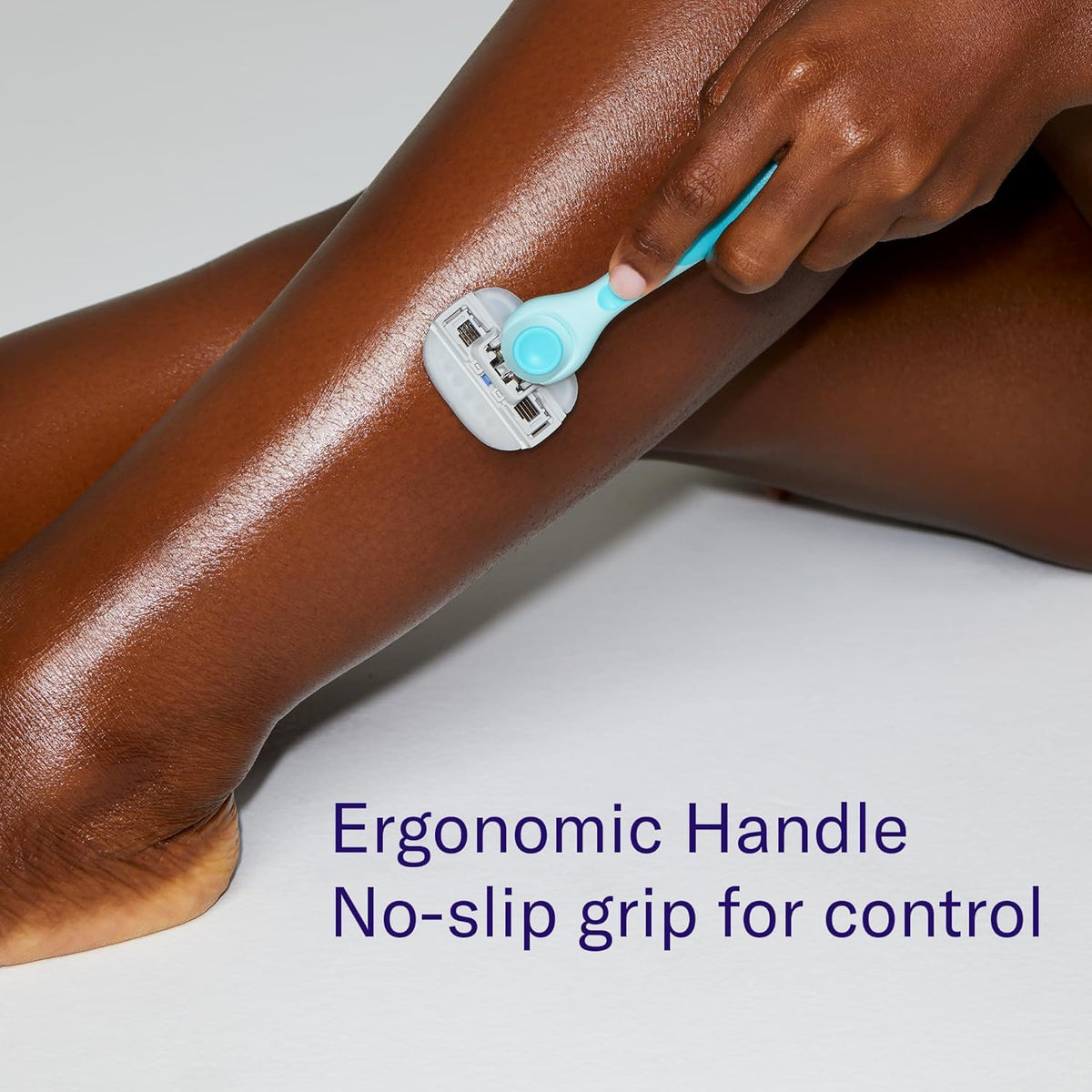 Flamingo razor in use shaving leg demonstrating easy maneuvering and comfort
