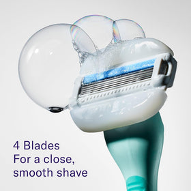 Flamingo razor held in hand showing scale and ergonomic fit for comfortable handling